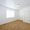 Bedroom with window and double closet