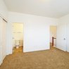 Bedroom with closet and view to the bathroom