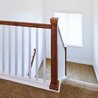 Upstairs landing with wood railing