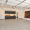 Garage with cabinets and wall storage