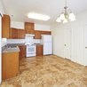 Kitchen and dining area with chandelier
